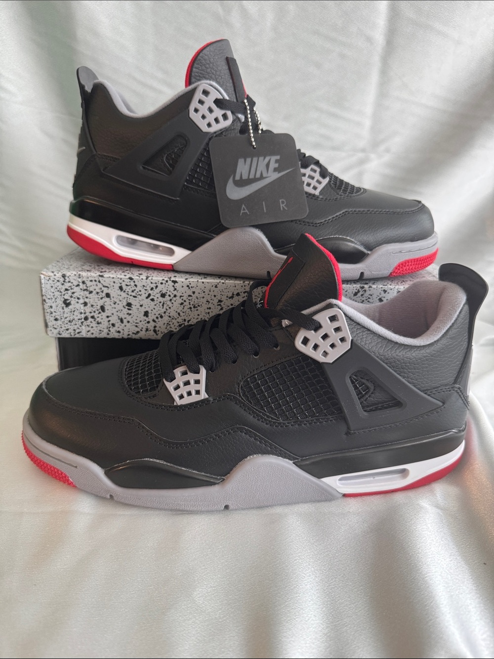 New! Nike Air Jordan 4 Retro Bred Reimagined sneaker feature black leather/upper